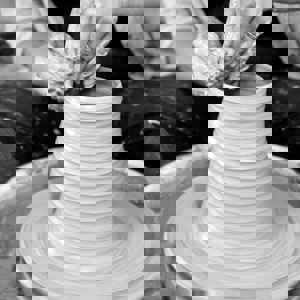 Throwing pots on the wheel Pauline Beauytman SEA DRIFT POTTERY.jpg