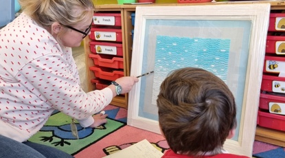 Teacher Collette Quinlan Working With Pupil To Look At Jennifer Hex, Gott Bay, Tiree