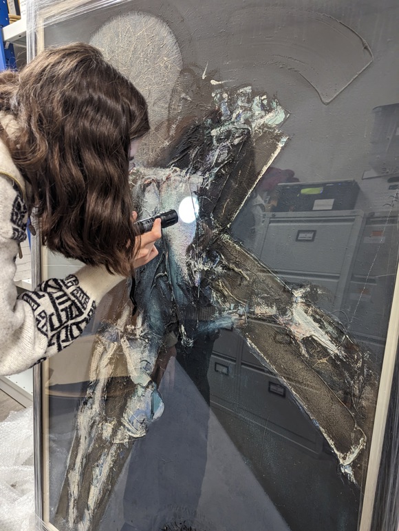Lily Vaughan condition checking The Argyll Collection, artwork Figure Crucified by Sir Robin Philipson, at Hermitage Academy, 2024, Credit CHARTS